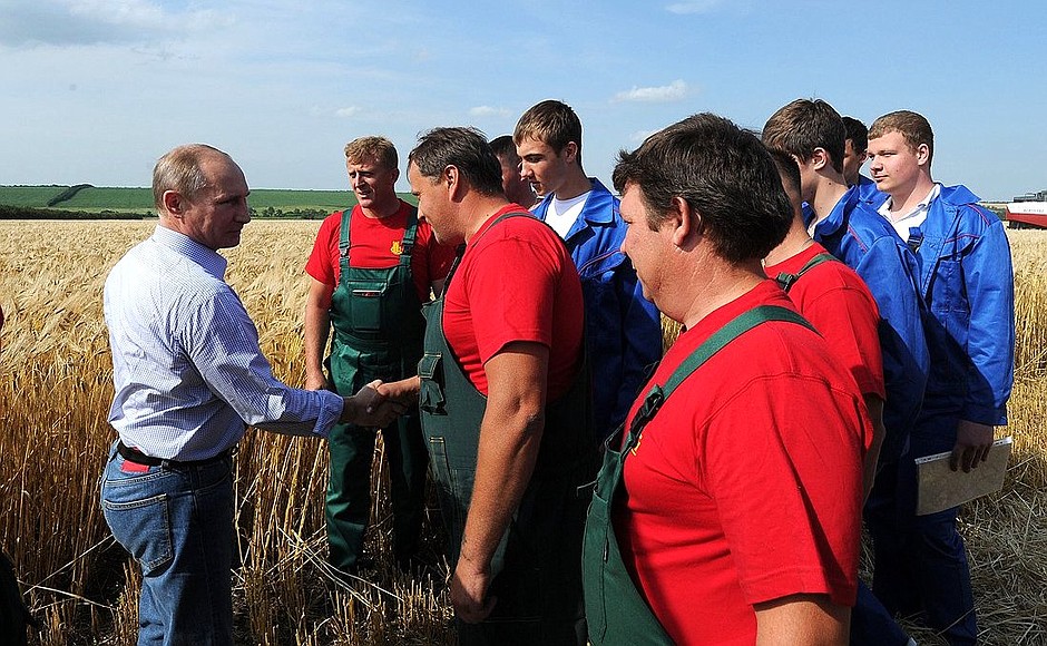 With workers at Rossiya Agricultural Cooperative.