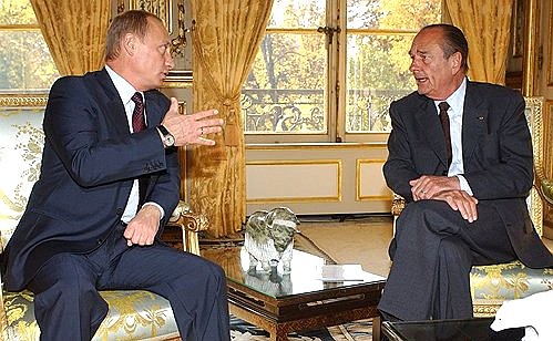 President Putin and French President Jacques Chirac in his office in the Palais de l\'Elysees.