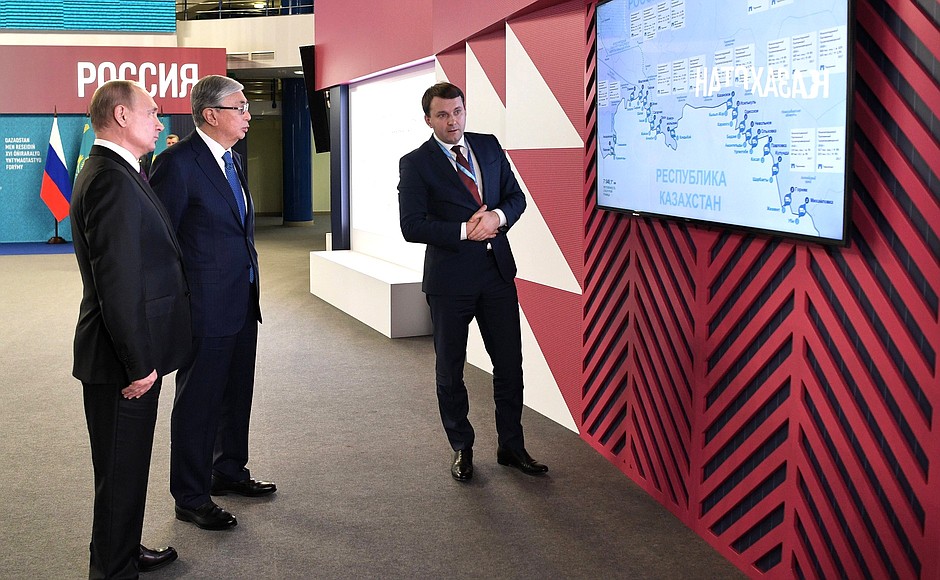 With President of Kazakhstan Kassym-Jomart Tokayev at the information stand on the programme for Russia-Kazakhstan border checkpoint cooperation. Russia’s Minister of Economic Development Maxim Oreshkin (right) gives explanations.