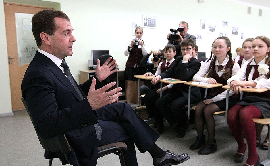 Year seven students of Cheboksary High School No.5 interview Dmitry Medvedev for the school newspaper and television channel.