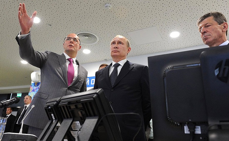 At the main operations centre of the 2014 Winter Olympics. With Deputy Prime Minister Dmitry Kozak (right) and President of the Organising Committee for the XXII Winter Olympic Games and XI Winter Paralympic Games in Sochi Dmitry Chernyshenko.