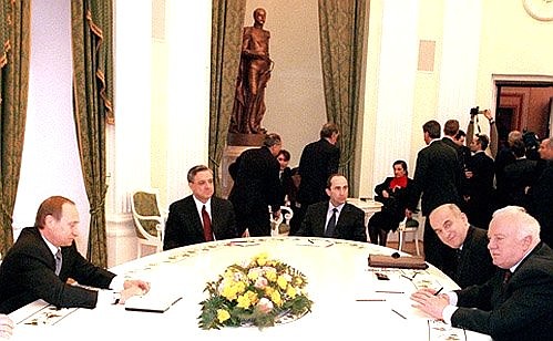 At a meeting of the leaders of the “Caucasian Four” countries with Armenian President Robert Kocharyan (center-right) and Georgian President Eduard Shevardnadze (right).