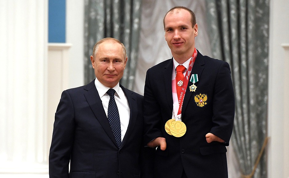 Presenting state decorations to winners of the 2020 Summer Paralympic Games in Tokyo. Mikhail Astashov, two-time cycling champion of the Paralympics, receives the Order of Friendship.
