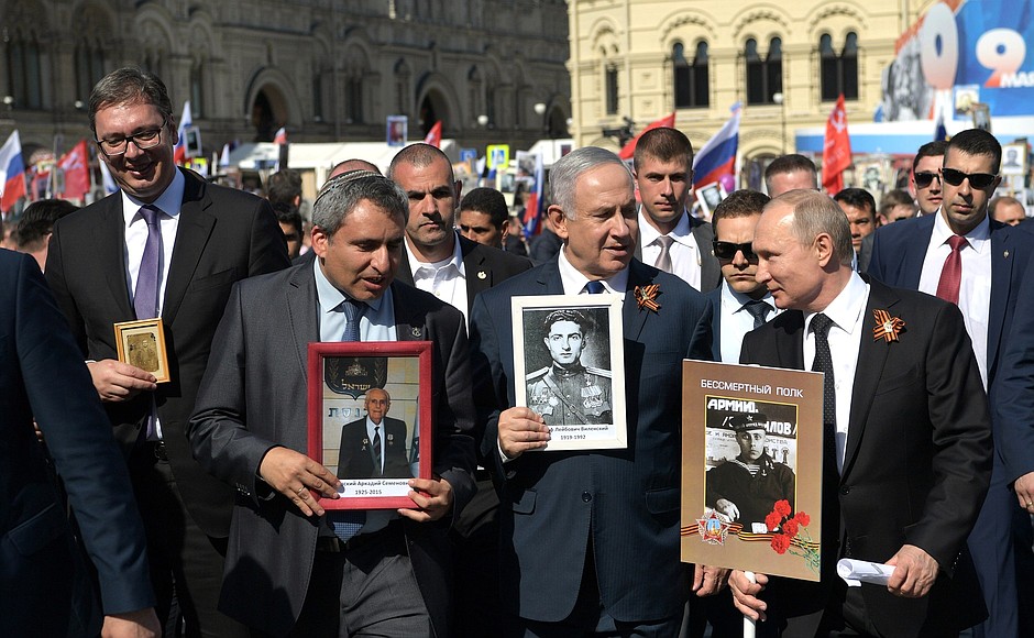 With Prime Minister of Israel Benjamin Netanyahu and President of Serbia Aleksandar Vucic, left, at the Immortal Regiment event.
