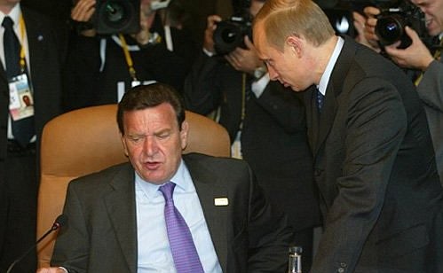 A meeting of the G8 heads of state and government. President Vladimir Putin with German Chancellor Gerhard Schroeder.