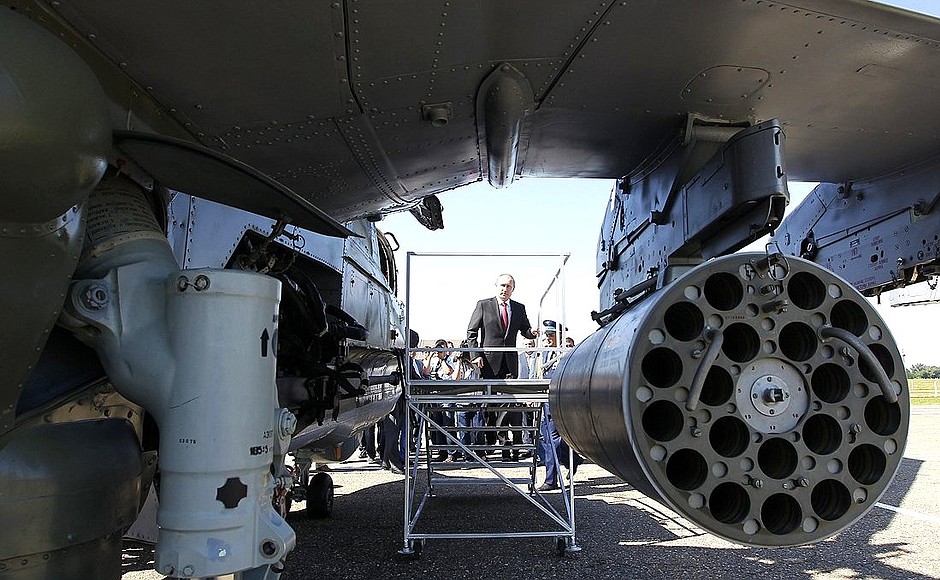 Inspecting samples of military equipment deployed at the 393rd Air Force base.