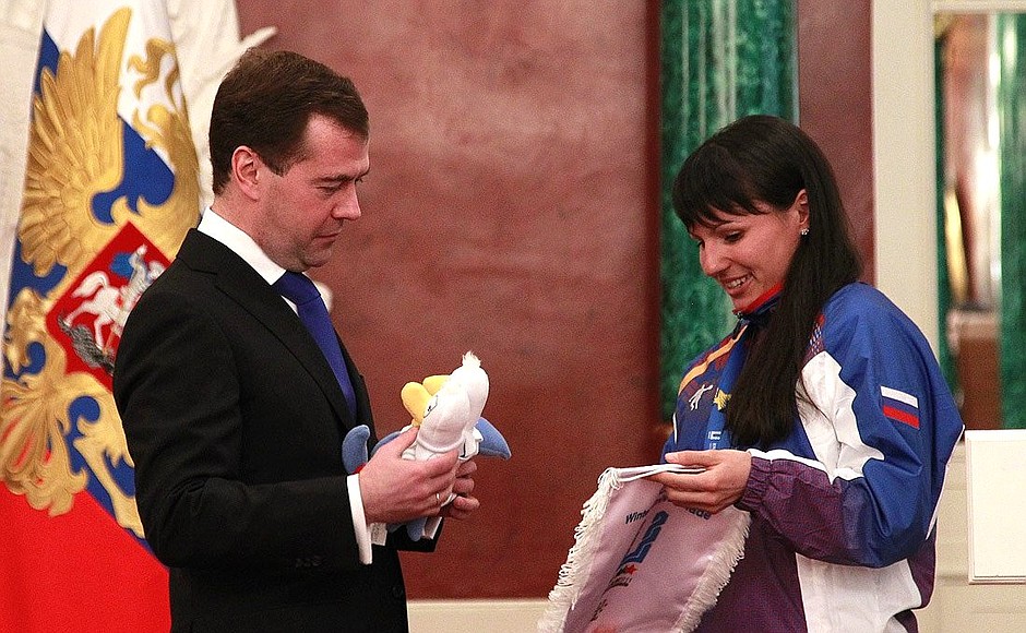Meeting with the winners and runners-up of the XXV World Winter Universiade. Two-time champion in cross-country skiing Alia Iksanova presented to Dmitry Medvedev a soft toy, a symbol of the Universiade.
