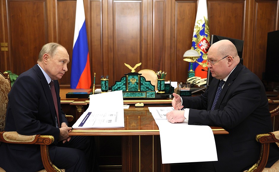 With Governor of Sevastopol Mikhail Razvozhayev.