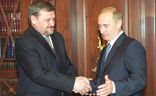 С главой администрации Чеченской Республики Ахматом Кадыровым.