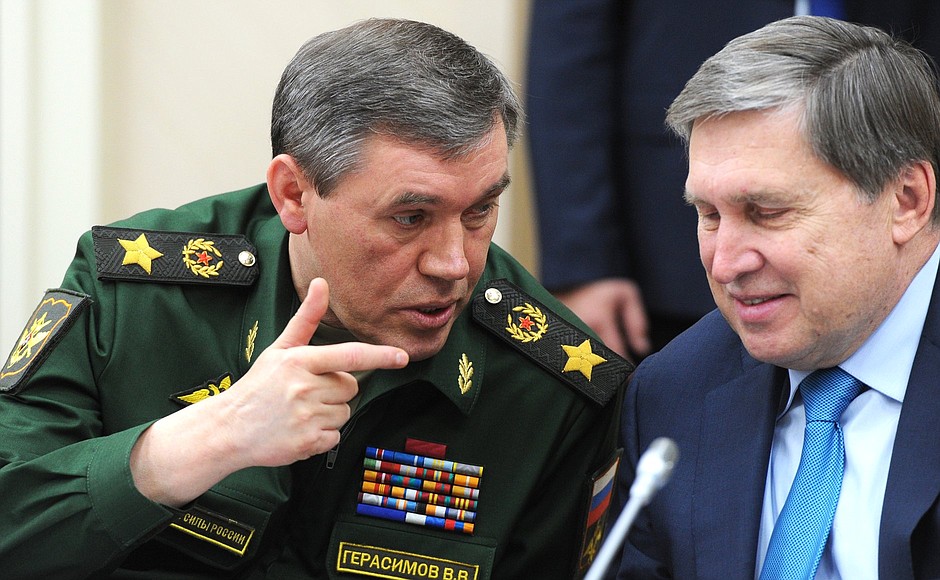 Chief of Armed Forces General Staff and First Deputy Defence Minister Valery Gerasimov (left) and Presidential Aide Yury Ushakov before the Security Council meeting.