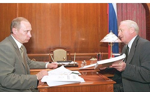 President Putin with Viktor Kress, Governor of the Tomsk Region and head of the State Council\'s working group on reforming the power industry.