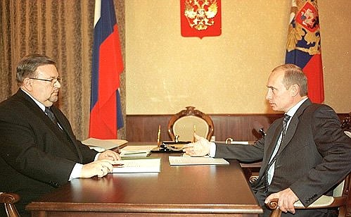 President Putin with Russian Minister Vladimir Zorin, who is in charge of national policy.