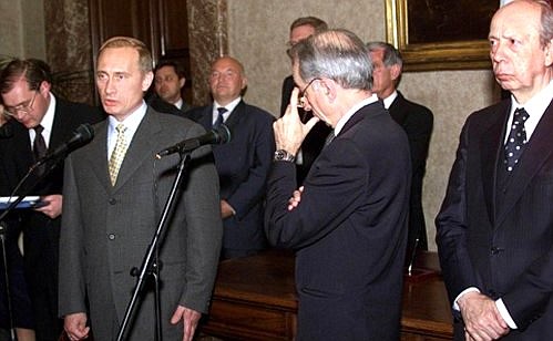 President Putin at a news conference with Italian Prime Minister Giuliano Amato.