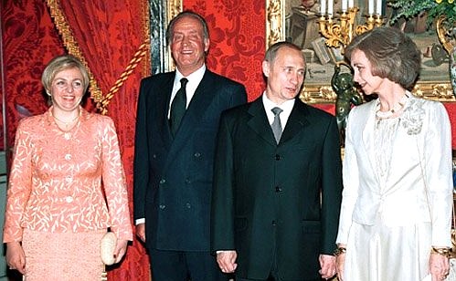 President Vladimir Putin, King Juan Carlos I of Spain and Queen Sophia (right) before a dinner in the Oriente Palace.