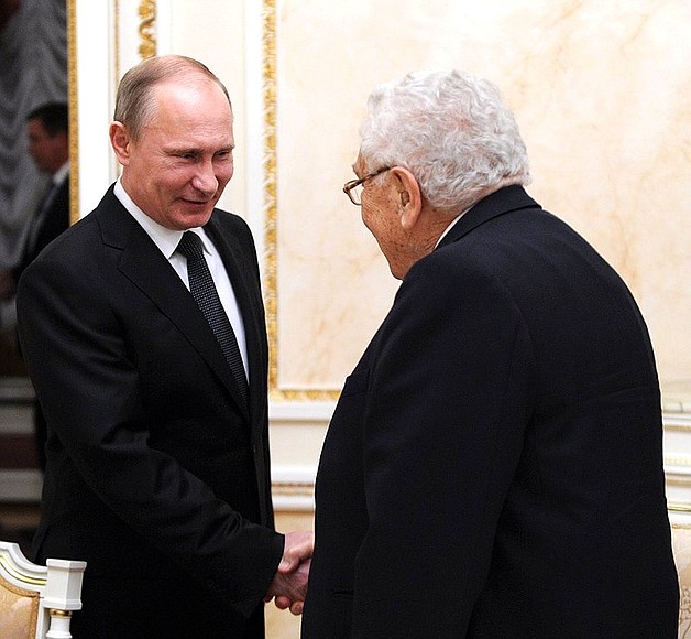 With former US Secretary of State Henry Kissinger.
