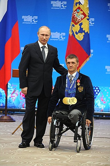 Meeting with XI Winter Paralympics medallists. Roman Petushkov, who won six gold medals in biathlon and cross-country skiing, was awarded the Order for Services to the Fatherland IV degree.