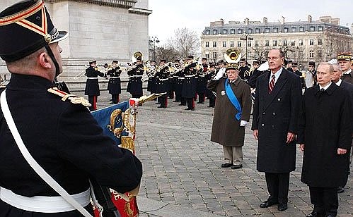 President Putin with French President Jacques Chirac during a wreath-laying ceremony at the Tomb of the Unknown Soldier.