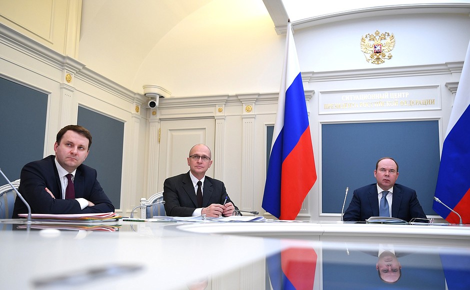 From left: Aide to the President Maxim Oreshkin, First Deputy Chief of Staff of the Presidential Executive Office Sergei Kiriyenko and Chief of Staff of the Presidential Executive Office Anton Vaino at the Kremlin Situation Centre during a meeting with regional heads on countering the spread of the coronavirus in Russia, held via videoconference.