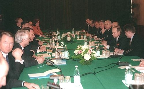 Acting President Vladimir Putin meeting with German businessmen and bankers.