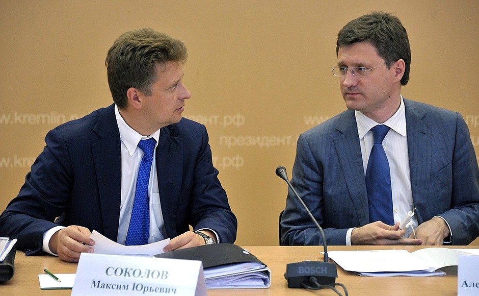 Before the meeting on the socioeconomic situation and business development in the Trans-Baikal Territory. Transport Minister Maxim Sokolov (left) and Energy Minister Alexander Novak.