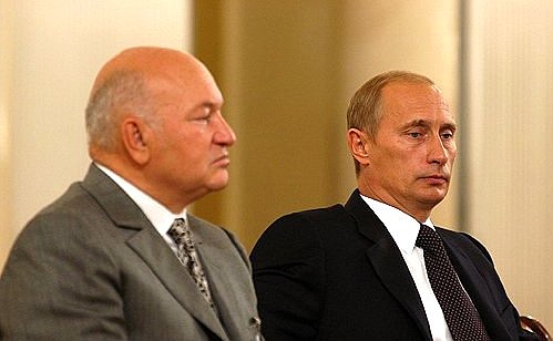 President Putin attending the Third Congress of the United Russia Party with Moscow Mayor Yury Luzhkov, co-chairman of the Party\'s Supreme Council.