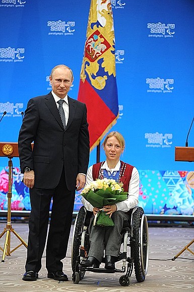 Meeting with XI Winter Paralympics medallists. Svetlana Konovalova, who won two gold medals, two silver medals and a bronze medal in biathlon and cross-country skiing, was awarded the Order for Services to the Fatherland IV degree.