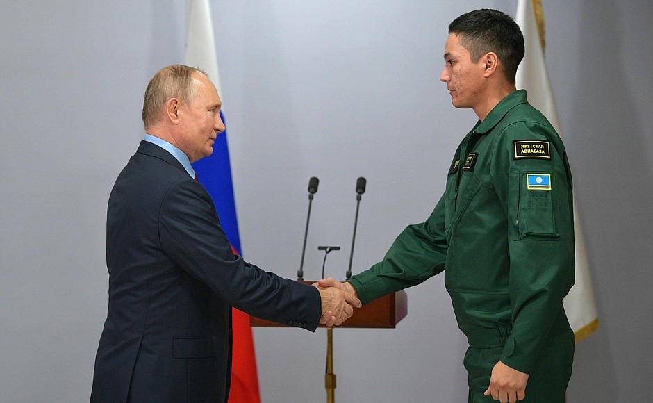 The ceremony to present state decorations of the Russian Federation. The Medal for Courage in a Fire is awarded to Boris Kruchinin, smokejumper at the Yakutsk Aerial Forest Protection Centre.
