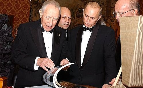 Before an official dinner in honour of President Putin and his wife, Lyudmila, hosted by Italian President Carlo Azeglio Ciampi.