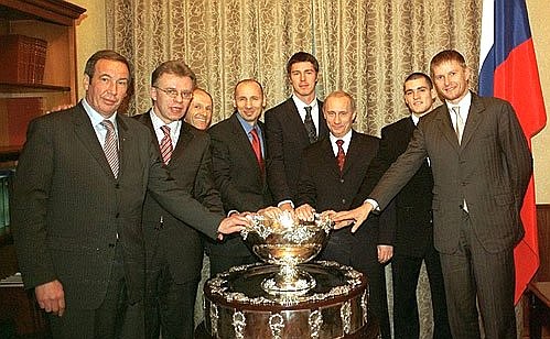 President Putin with the national tennis team, its trainer Shamil Tarpishchev and Vyacheslav Fetisov, State Sports Committee head, left.