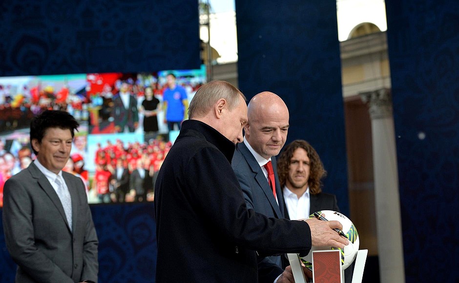 With FIFA President Gianni Infantino at a ceremony marking the start of the 2018 Football World Cup Volunteer Programme.