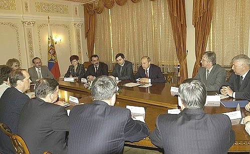 President Putin meeting with the members of the Central Election Commission.