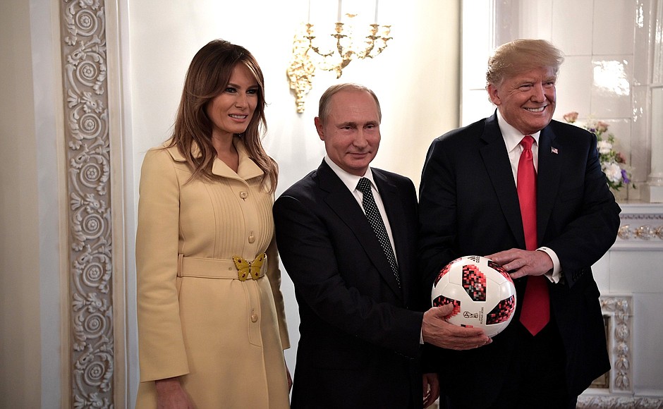 Vladimir Putin presented Donald Trump with an official football from the 2018 FIFA World Cup Russia and wished the United States success in holding the 2026 World Cup. On the left – Melania Trump, the current First Lady and wife of President Donald Trump.