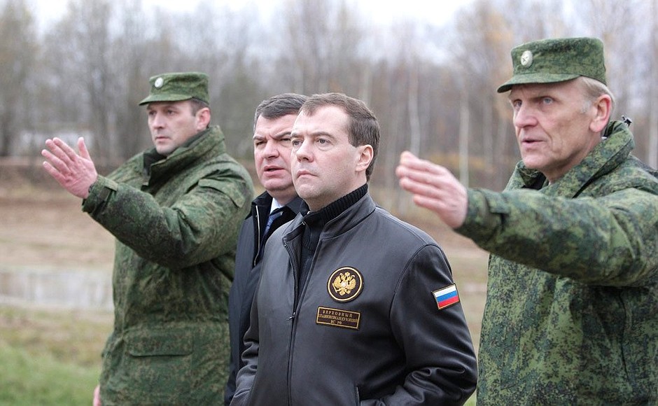 Visiting military base at Timonovo settlement. With Defence Minister Anatoly Serdyukov (second from the left).