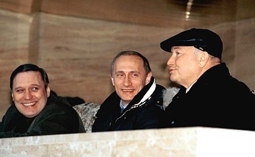 Acting President Vladimir Putin, First Deputy Prime Minister and Finance Minister Mikhail Kasyanov (left) and Moscow Mayor Yuri Luzhkov watching a football match between Spartak Moscow and Alania Vladikavkaz.