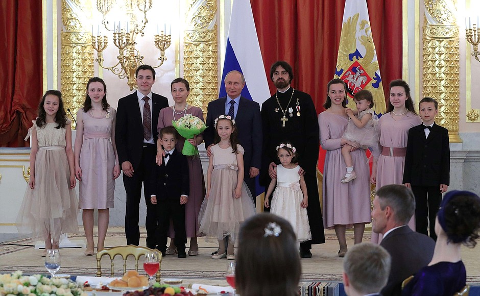Presenting the order to the Ilyashenko family from Moscow.
