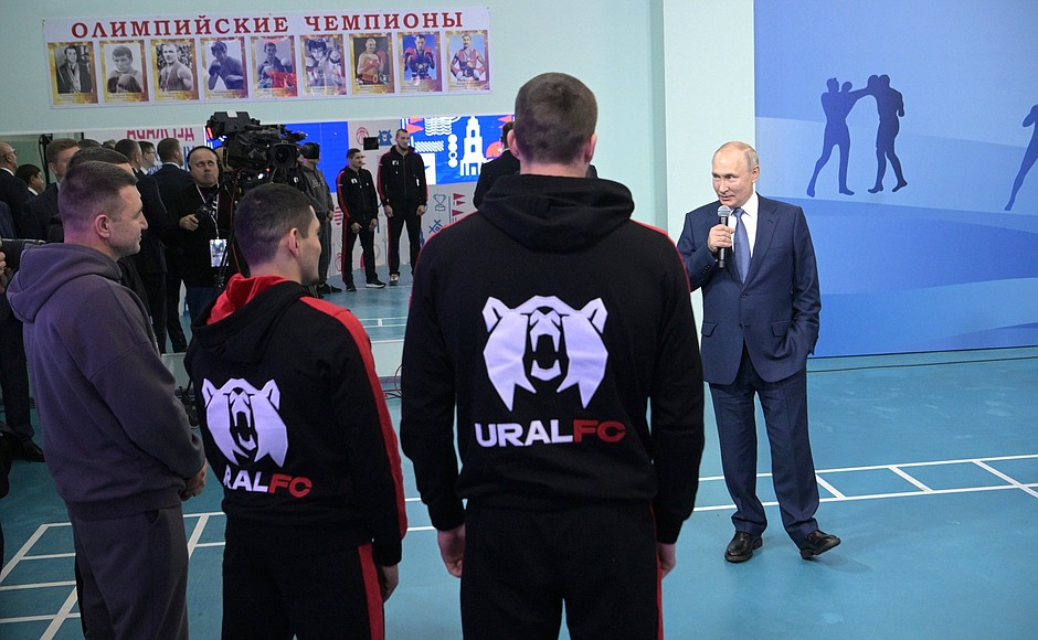 At the meeting with participants in a professional boxing tournament.