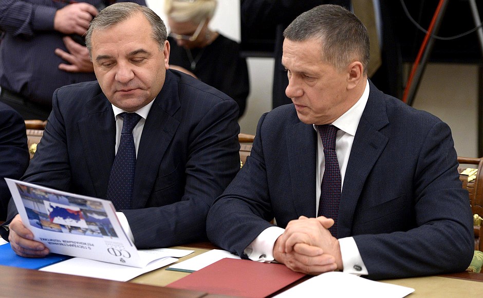 Emergencies Minister Vladimir Puchkov (left) and Deputy Prime Minister and Presidential Plenipotentiary Envoy to the Far Eastern Federal District Yury Trutnev before a Security Council meeting.
