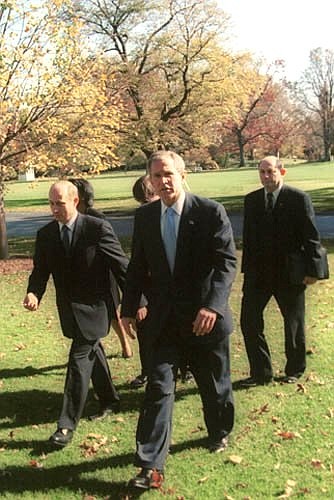 C. President Vladimir Putin and US President George W. Bush in the White House before bilateral negotiations.