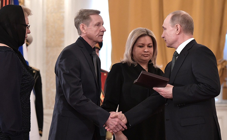 Ceremony for presenting national awards. 
Vladimir Putin awarded the Gold Star of the Hero of Russia to relatives of Major Roman Filipov, a military pilot who died in Syria.