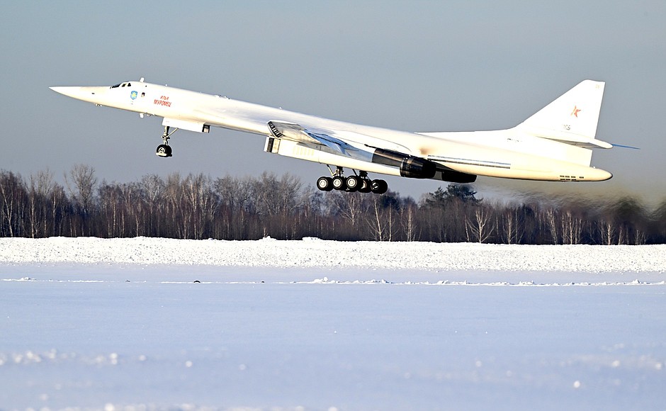 Vladimir Putin flies a Tu-160M missile carrier.