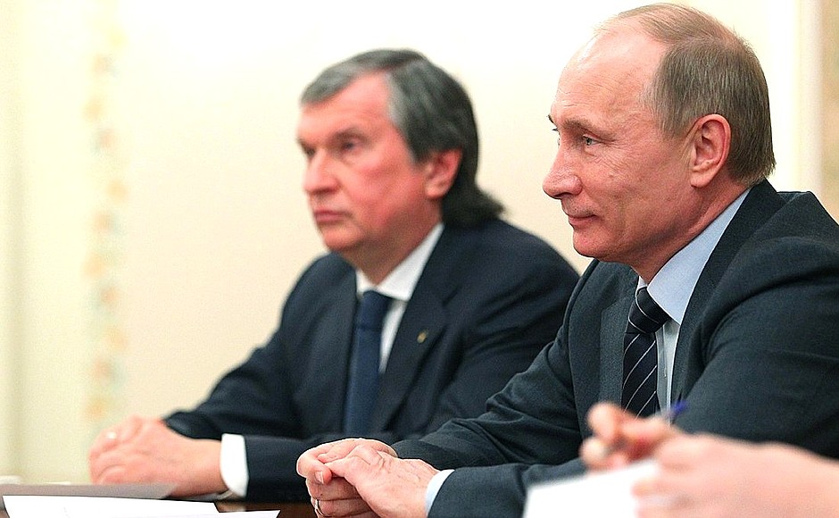 With Rosneft CEO Igor Sechin at a meeting with heads of Rosneft and BP.