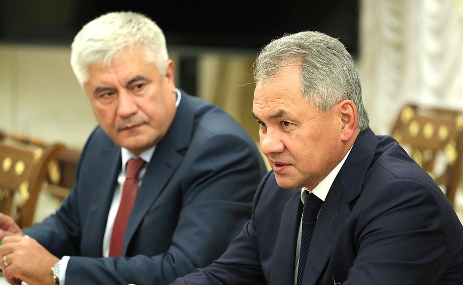 Before the meeting with permanent members of the Security Council. Defence Minister Sergei Shoigu (right) and Interior Minister Vladimir Kolokoltsev.
