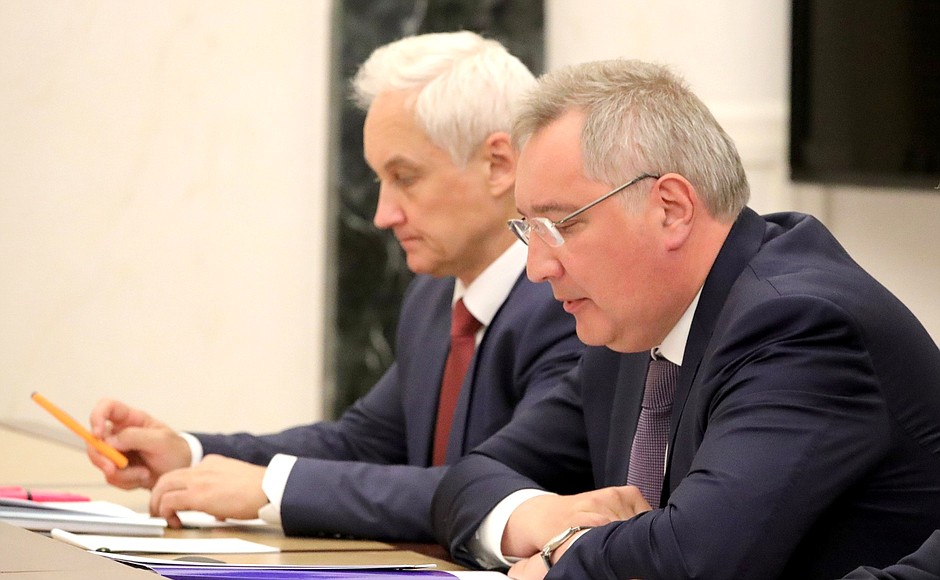 Presidential Aide Andrei Belousov (left) and General Director of the State Space Corporation ROSCOSMOS at a meeting with its executives.