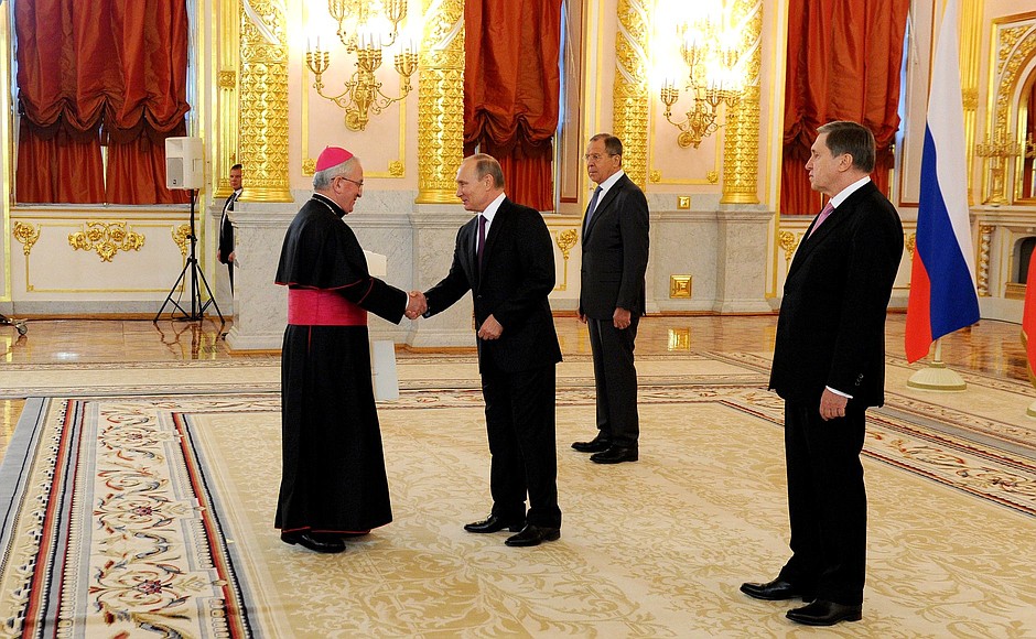 Presentation by foreign ambassadors of their letters of credence. Apostolic Nuncio Archbishop Celestino Migliore presents his letter of credence to the President.