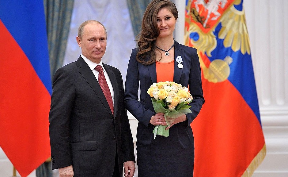 Anastasia Bourt, a correspondent at Rossiya 24, is awarded the medal For Courage.