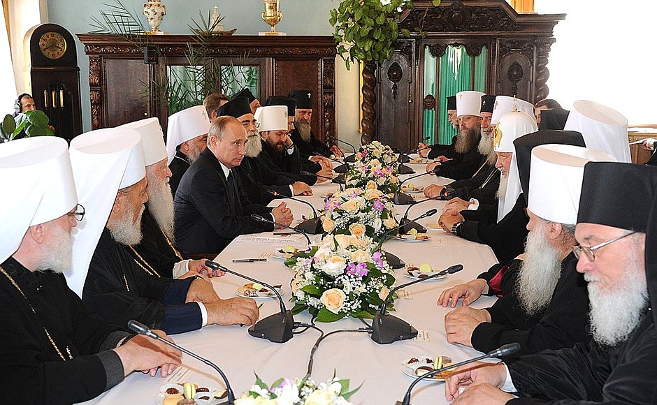Meeting with members of the Holy Synod and representatives of local Orthodox Churches.