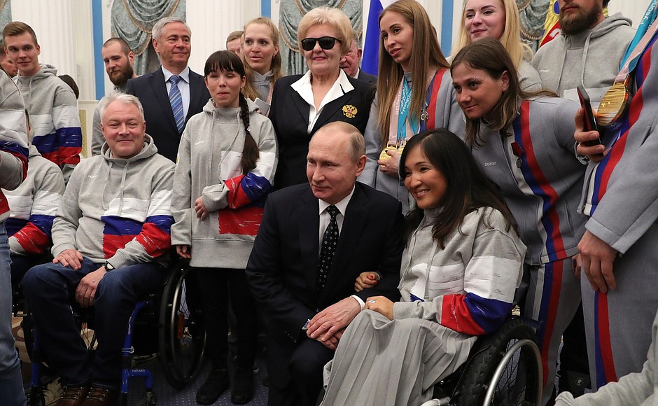 With participants of the PyeongChang 2018 Paralympic Winter Games.