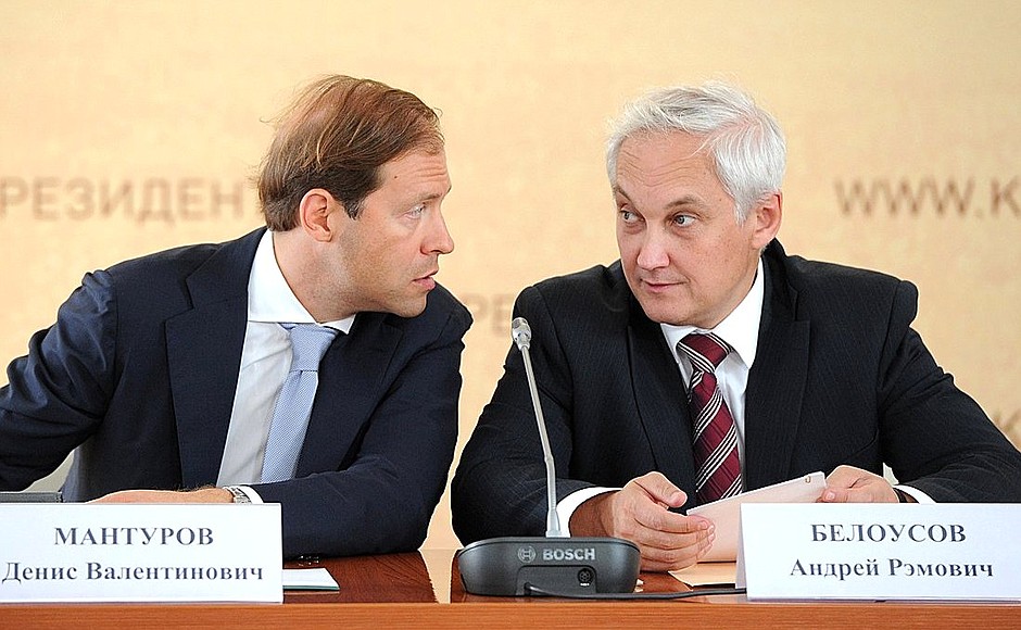 Industry and Trade Minister Denis Manturov (left) and Presidential Aide Andrei Belousov at a meeting on the harvest.