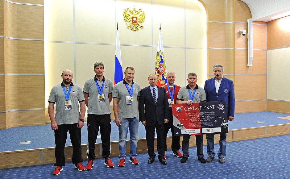 With the winners of the 5th National Amateur Ice Hockey Teams' Festival.