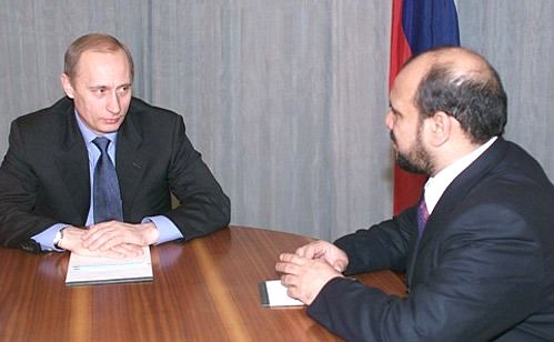 President Vladimir Putin meeting First Deputy Head of the Afghan Interim Government, Defence Minister, Mohammad Fahim.